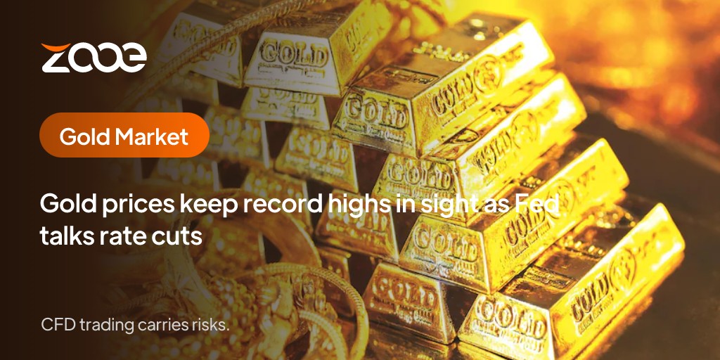 Gold prices keep record highs in sight as Fed talks rate cuts